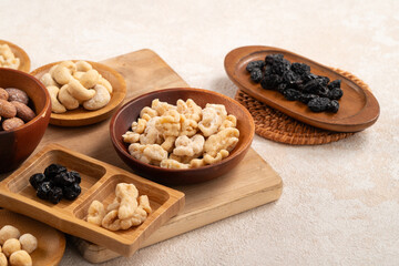 Flavored mixed nuts in bowls.