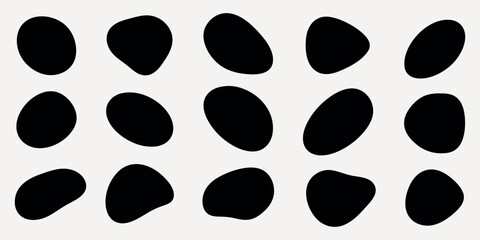 Abstract black oval shapes on a beige background. The black shapes create a pattern. Abstract design with black ovals on beige. Minimalist and modern art. Black shape vector set.