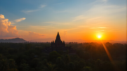 Obraz premium Sunset Over an Ancient Temple Surrounded by Jungle