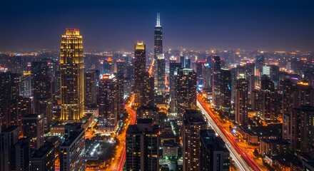 Naklejka premium Vibrante horizonte nocturno de una ciudad con rascacielos iluminados y semáforos – Metrópolis urbana