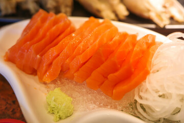 Raw salmon fillet on the skin 
