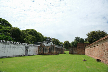 View of ruins and lawn in Phra Narai Ratchaniwet, Lopburi, Thailand