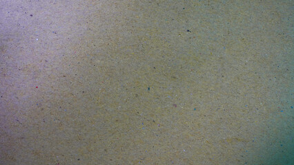 Close-up of textured recycled cardboard surface.