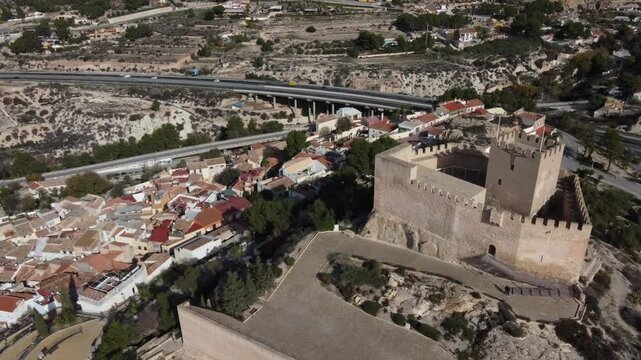 Aerial approach to the arab castle and old town of Petrer, Spain