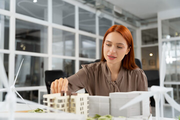 Ginger young specialist working on a inclusive living area project