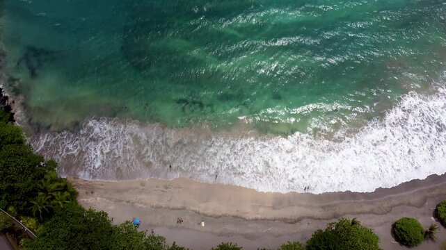 Hamoa Beach Hana Maui Hawaii &ndash; Cinematic video of this must-see Maui beach, known for its clear waters, strong surf, and lush green backdrop. A visual paradise