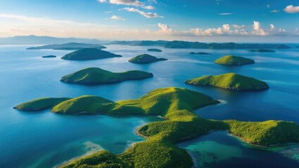 Aerial View of Lush Green Islands Surrounded by Turquoise Waters Under Clear Blue Skies on a Sunny Day