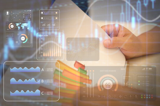 investment financial concept Business finance data analytics graph.Financial management technology.Businessman review data chart and virtual charts stock buy and sell on virtual screen