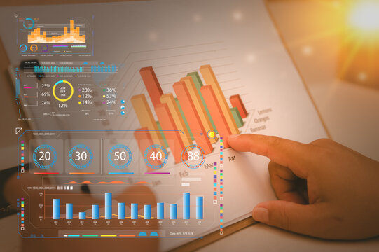 investment financial concept Business finance data analytics graph.Financial management technology.Businessman review data chart and virtual charts stock buy and sell on virtual screen