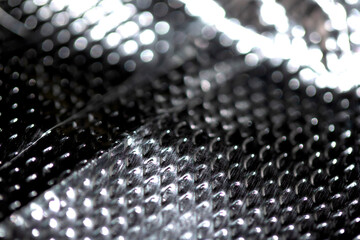Industrial foil shiny background with rivets and crumpled lines