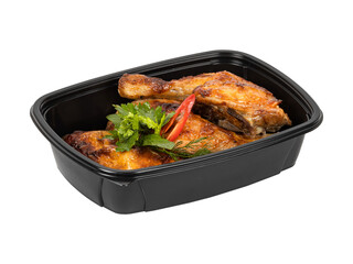 A black plastic container of food on a white background