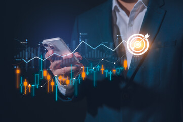 Businessman using smartphone analyzing trading graph financial data. Business finance background.business finance technology and investment concept. Stock Market Investment Fund and Digital Asset