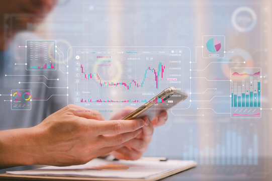 Businessman using smartphone analyzing trading graph financial data. Business finance background.business finance technology and investment concept. Stock Market Investment Fund and Digital Asset - Powered by Adobe