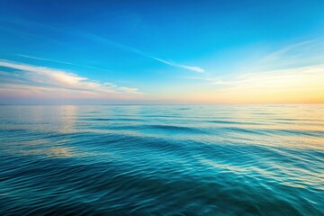 Fototapeta premium Serene Minimalist Ocean: Pale Blue Sky, Calm Waves, Tranquil Horizon
