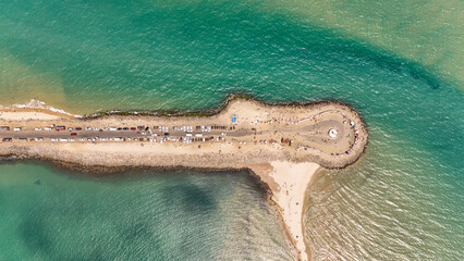 A stunning aerial view of Dhanushkodi, the ghost town of Tamil Nadu, surrounded by the vast Indian Ocean