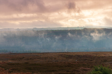 Fototapeta premium Low Clouds over Moorland and Hamsterley Forest, County Durham, England, UK.