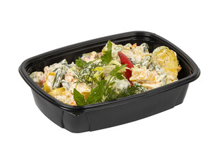 A black container filled with salad on a white background
