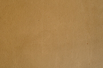 Background smooth, beige textured surface with subtle variations in color and tone