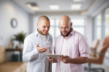 Inspired young entrepreneur talking to business partner