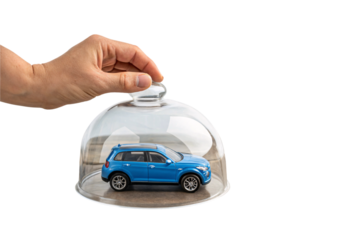 A blue toy SUV under a glass dome, highlighting the concept of protection, ownership, and auto insurance coverage, isolated on a transparent background