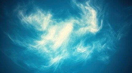 a blue sky with wispy clouds.