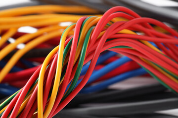 Many colorful electrical wires as background, closeup