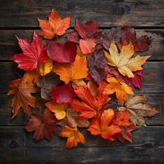 Obraz premium A seamless vector background featuring vibrant autumn leaves in warm hues of orange, red, and yellow, creating a cozy seasonal atmosphere.