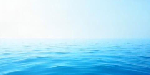 Obraz premium Serene blue ocean water, calm sea surface with soft horizon, peaceful aquatic background
