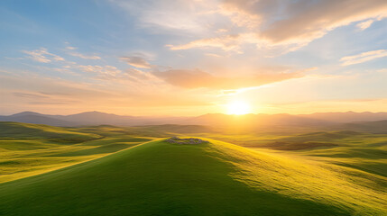 Obraz premium Scenic view of rolling green hills under a golden sunrise, creating a tranquil landscape. Perfect for travel blogs, nature photography, or relaxation themes. Selective focus