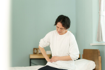 体調不良のミドル男性