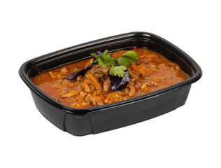 A black container filled with stew on a white background