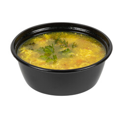 A black bowl filled with soup on a white background