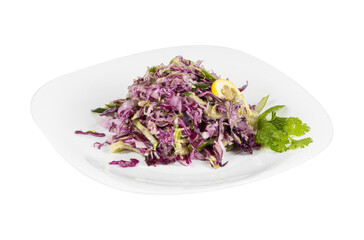 A white plate with a salad of purple cabbage and cucumber