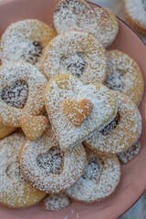 Linzer cookies with heart with raspberry jam 