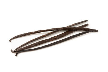 Vanilla pods isolated on white background. Vanilla flowers and seeds. vanilla stick bean. Aromatic spicy spice for pastries and desserts. Seasoning. Space for text. Copy Space