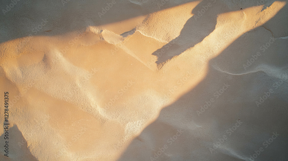 Poster sunlit smooth clay wall texture with play of light and shadow for modern designs
