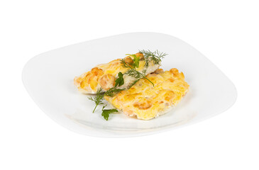 A white plate with two pieces of food on a white background