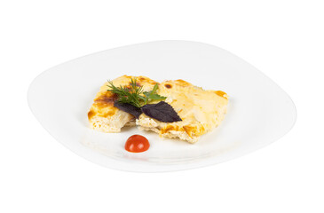 A white plate topped with delicious food and rich tomato sauce