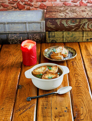 French onion soup topped with crusty bread slices