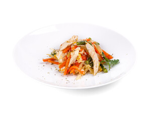 A white ceramic plate beautifully topped with chicken, carrots, and green beans