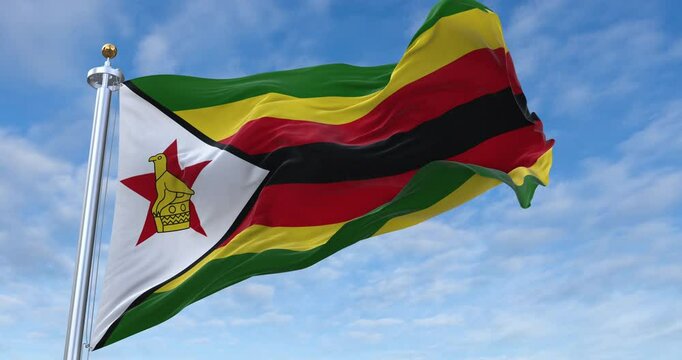 Zimbabwe flag with flagpole waving in wind, rolling clouds background looping, 4K video (Perfect Loop)