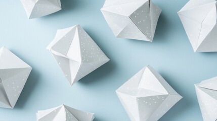 Fototapeta premium Geometric white paper boxes on blue background.