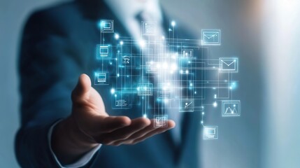 Businessman Holding Digital Flow Chart with Process Diagram and Structure Icons on Transparent Screen over Blue Background, Close-up, Symbolizing Architecture, Business Planning, Technology, and Manag