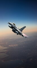 F-16 fighter jet in flight with afterburner over cityscape at sunset