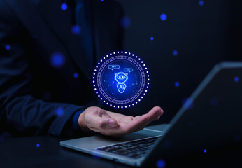 Businessman using AI robot technology. A man uses a laptop to talk to AI artificial intelligence. Future technology.