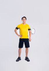 Portrait of Asian man playing badminton on white background.