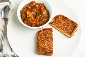 beef stew  with cheese melt sandwich,