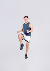 Portrait of healthy Asian man exercising on white background