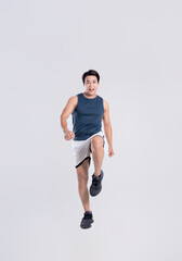Portrait of healthy Asian man exercising on white background