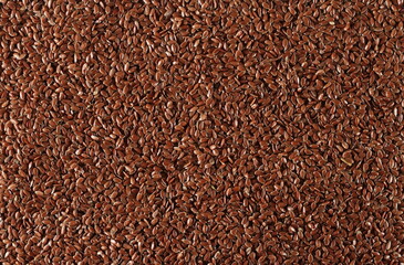 Flaxseed grains background and texture